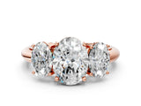 Rose gold Three-Stone Oval Cut Diamond Engagement Ring with Prong Setting on a White Gold Band_38