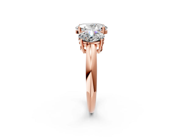 Rose gold Three-Stone Oval Cut Diamond Engagement Ring with Prong Setting on a White Gold Band