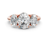 Rose gold Three-Stone Oval Cut Diamond Engagement Ring with Prong Setting on a White Gold Band_6