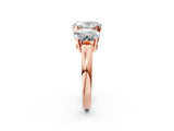 Rose gold Three-Stone Oval Cut Diamond Ring with Channel Set Band and Four-Prong Setting_20