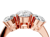 Rose gold Three-Stone Oval Cut Diamond Ring with Channel Set Band and Four-Prong Setting_22