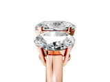 Rose gold Three-Stone Oval Cut Diamond Ring with Channel Set Band and Four-Prong Setting_23