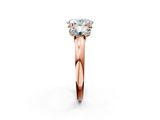 Rose gold Three-Stone Oval Cut Diamond Ring with Channel-Set Band and Four-Prong Setting_51