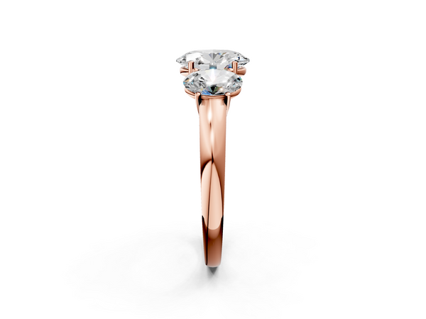 Rose gold Oval Cut Diamond Three-Stone Ring with Four-Prong Setting and Classic Band
