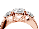 Rose gold Three-Stone Oval Cut Diamond Ring with Channel-Set Band and Four-Prong Setting_53