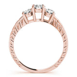 Rose gold Three-Stone Oval Cut Diamond Ring with Channel-Set Band and Prong Setting 2