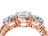 Rose gold Three-Stone Oval Cut Diamond Ring with Channel-Set Band and Prong Setting_10