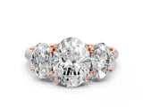 Rose gold Three-Stone Oval Cut Diamond Ring with Pavé Band and Prong Setting_86