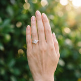 Rose gold Three-Stone Oval Cut Diamond Ring with Pear Side Stones and Four-Prong Setting_13