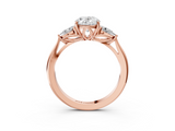 Rose gold Three-Stone Oval Cut Diamond Ring with Pear Side Stones in Four-Prong Setting_173