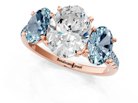 Rose gold Three-Stone Oval Cut Diamond Ring with Round with Aquamarine side stone Pavé Band and Prong Setting_1