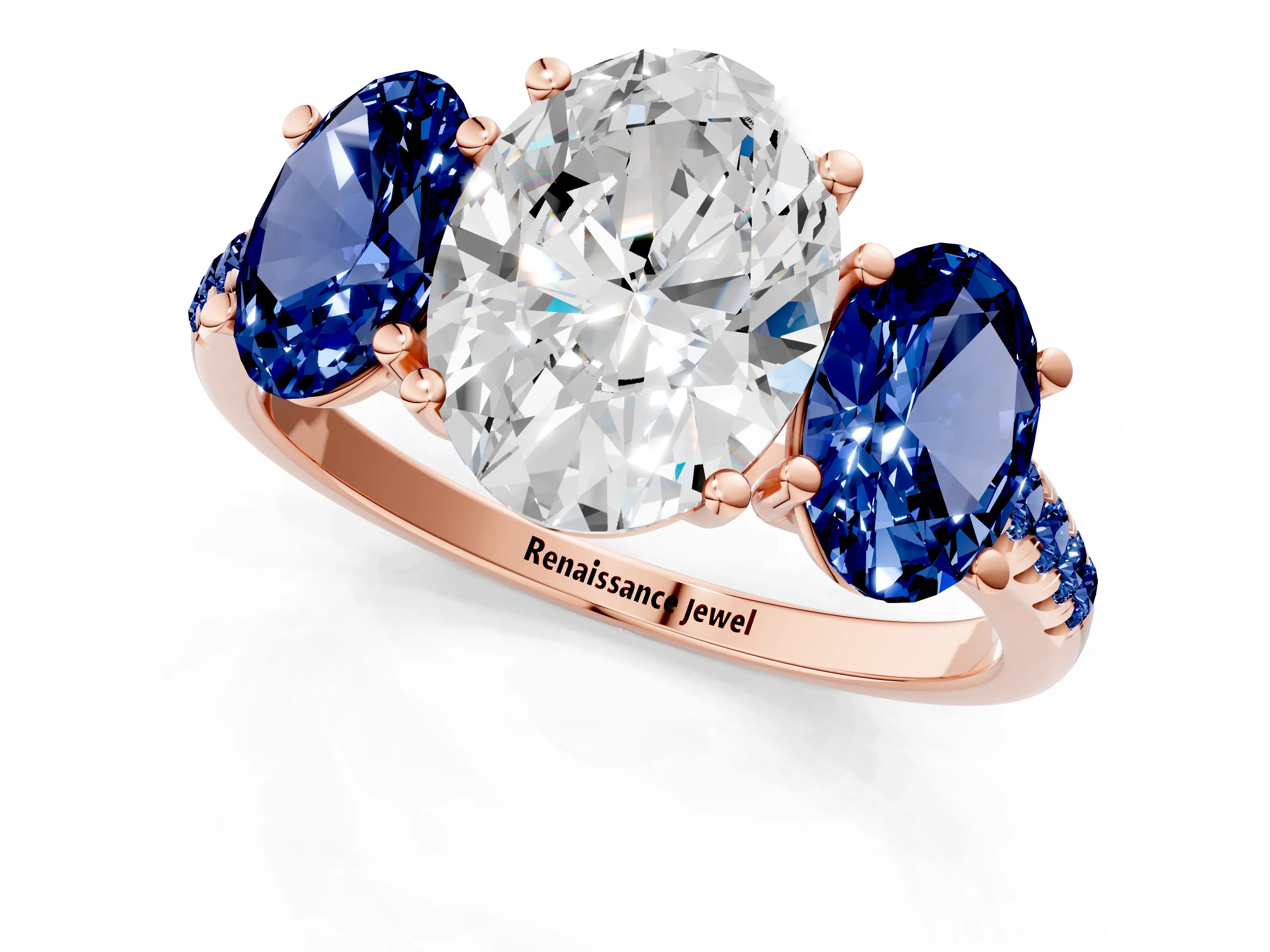 Rose gold Three-Stone Oval Cut Diamond Ring with Round with Blue Sapphire side stone Pavé Band and Prong Setting_1