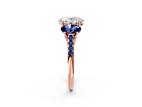 Rose gold Three-Stone Oval Cut Diamond Ring with Round with Blue Sapphire side stone Pavé Band and Prong Setting_2