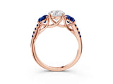 Rose gold Three-Stone Oval Cut Diamond Ring with Round with Blue Sapphire side stone Pavé Band and Prong Setting_3