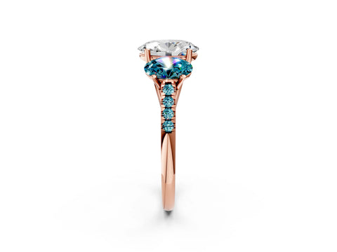 Rose gold Three-Stone Oval Cut Diamond Ring with Round with Blue Topaz side stone Pavé Band and Prong Setting_2