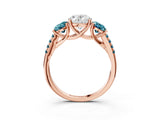 Rose gold Three-Stone Oval Cut Diamond Ring with Round with Blue Topaz side stone Pavé Band and Prong Setting_3