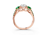 Rose gold Three-Stone Oval Cut Diamond Ring with Round with Emerald side stone Pavé Band and Prong Setting_3