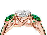 Rose gold Three-Stone Oval Cut Diamond Ring with Round with Emerald side stone Pavé Band and Prong Setting_4