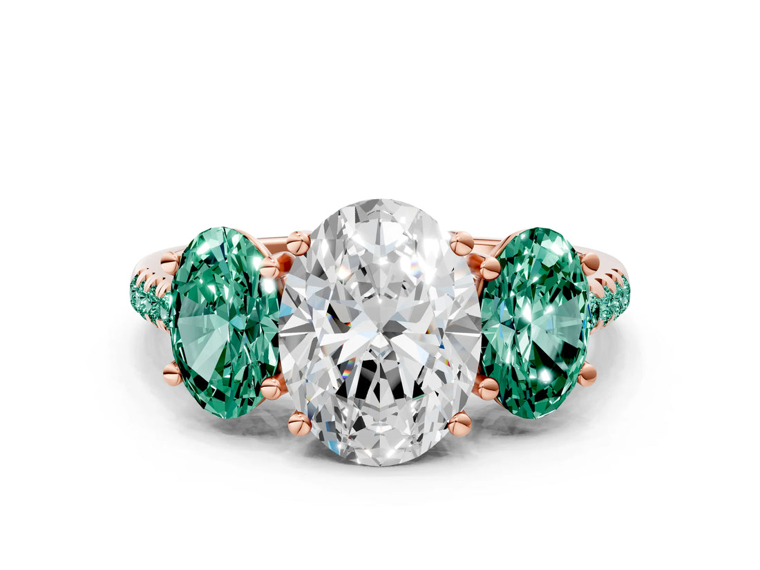 Rose gold Three-Stone Oval Cut Diamond Ring with Round with Green Sapphire side stone Pavé Band and Prong Setting