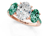 Rose gold Three-Stone Oval Cut Diamond Ring with Round with Green Sapphire side stone Pavé Band and Prong Setting_1