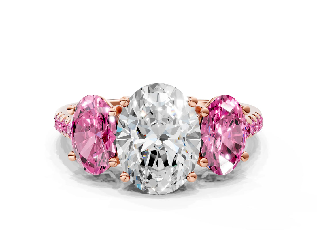 Rose gold Three-Stone Oval Cut Diamond Ring with Round with Pink Sapphire side stone Pavé Band and Prong Setting