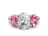 Rose gold Three-Stone Oval Cut Diamond Ring with Round with Pink Sapphire side stone Pavé Band and Prong Setting