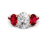 Rose gold Three-Stone Oval Cut Diamond Ring with Round with Ruby side stone Pavé Band and Prong Setting