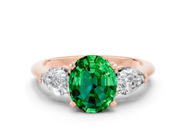 Rose gold Three-Stone Oval Cut Emerald Ring with Pear Side Stones and Four-Prong Setting