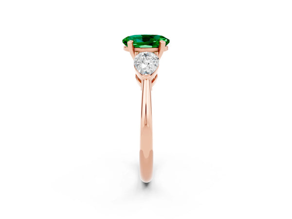 Rose gold Three-Stone Oval Cut Emerald Ring with Pear Side Stones and Four-Prong Setting