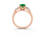 Rose gold Three-Stone Oval Cut Emerald Ring with Pear Side Stones and Four-Prong Setting_3