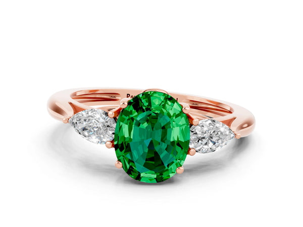 Rose gold Three-Stone Oval Cut Emerald Ring with Pear  Side Stones in Four-Prong Setting
