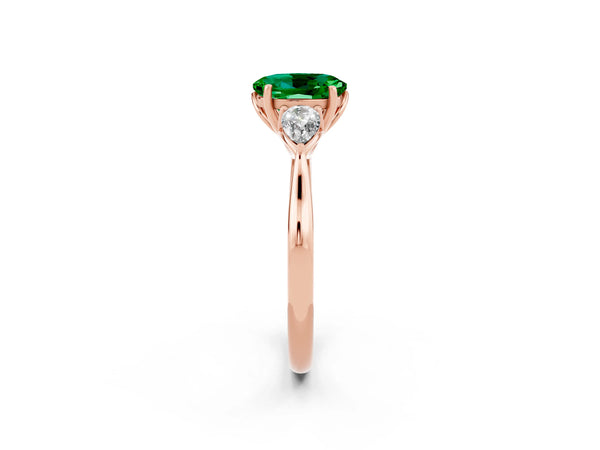 Rose gold Three-Stone Oval Cut Emerald Ring with Pear  Side Stones in Four-Prong Setting