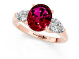 Rose gold Three-Stone Oval Cut Garnet Ring with Pear Side Stones and Four-Prong Setting_1