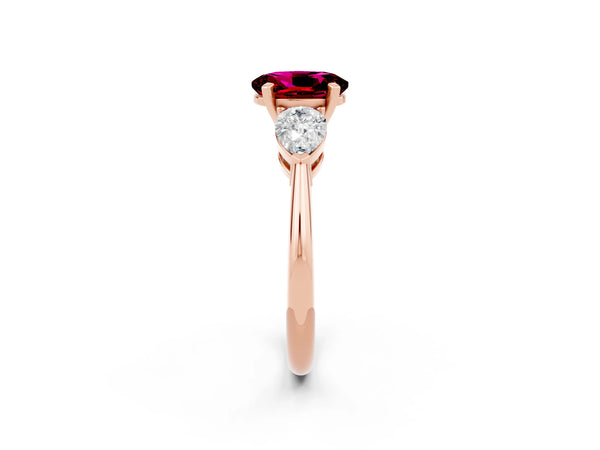 Rose gold Three-Stone Oval Cut Garnet Ring with Pear Side Stones and Four-Prong Setting