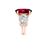 Rose gold Three-Stone Oval Cut Garnet Ring with Pear Side Stones and Four-Prong Setting_5
