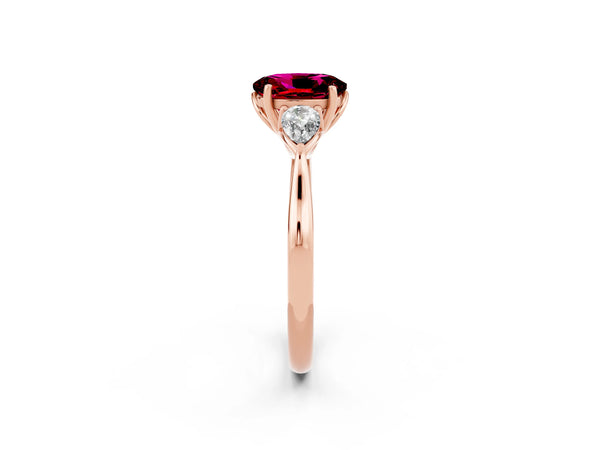 Rose gold Three-Stone Oval Cut Garnet Ring with Pear  Side Stones in Four-Prong Setting