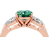 Rose gold Three-Stone Oval Cut Green Sapphire Ring with Pear Side Stones and Four-Prong Setting_4