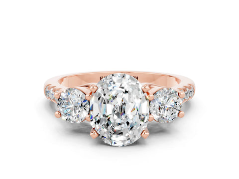 Rose gold Three-Stone Oval Cut Moissanite Pavé Band with Four-Prong Setting