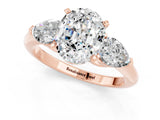 Rose gold Three-Stone Oval Cut Moissanite Ring with Pear Side Stones and Four-Prong Setting_1