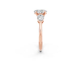 Rose gold Three-Stone Oval Cut Moissanite Ring with Pear Side Stones and Four-Prong Setting_2