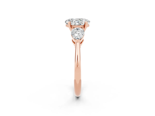 Rose gold Three-Stone Oval Cut Moissanite Ring with Pear Side Stones and Four-Prong Setting