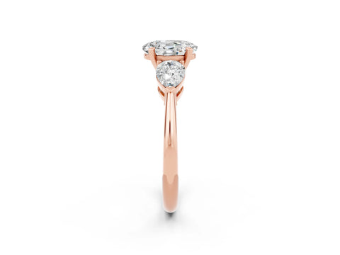 Rose gold Three-Stone Oval Cut Moissanite Ring with Pear Side Stones and Four-Prong Setting_2