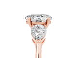 Rose gold Three-Stone Oval Cut Moissanite Ring with Pear Side Stones and Four-Prong Setting_5