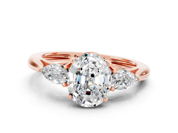 Rose gold Three-Stone Oval Cut Moissanite Ring with Pear  Side Stones in Four-Prong Setting
