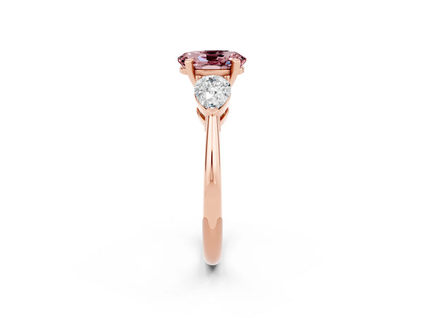 Rose gold Three-Stone Oval Cut Morganite Ring with Pear Side Stones and Four-Prong Setting