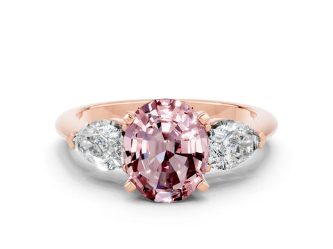 Rose gold Three-Stone Oval Cut Morganite Ring with Pear Side Stones and Four-Prong Setting