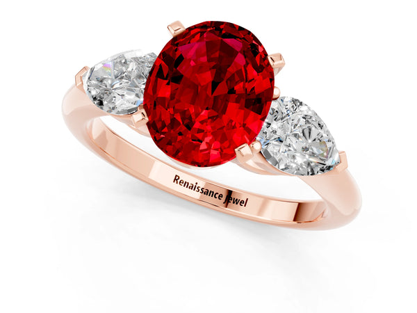 Rose gold Three-Stone Oval Cut Ruby Ring with Pear Side Stones and Four-Prong Setting