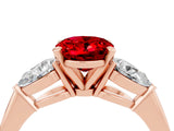 Rose gold Three-Stone Oval Cut Ruby Ring with Pear Side Stones and Four-Prong Setting_4