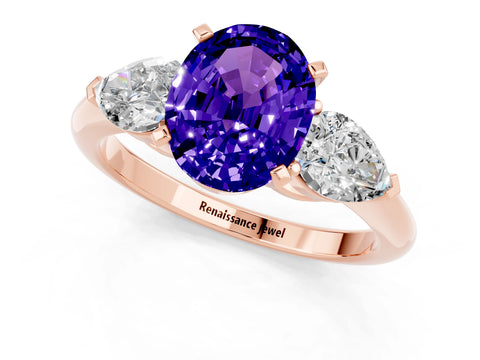 Rose gold Three-Stone Oval Cut Tanzanite Ring with Pear Side Stones and Four-Prong Setting_1