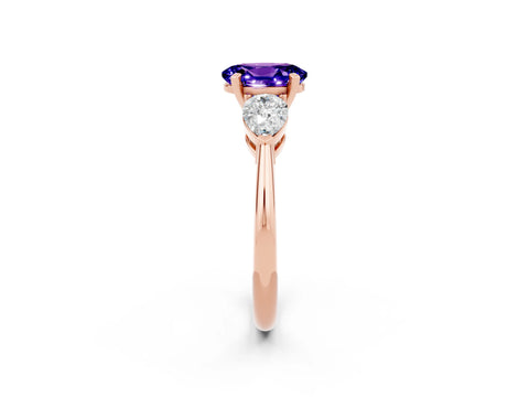 Rose gold Three-Stone Oval Cut Tanzanite Ring with Pear Side Stones and Four-Prong Setting_2